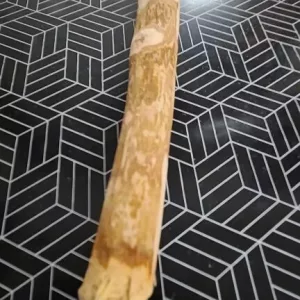 Asiakkaan E****a vastaanottama koiran puinen purutikku.